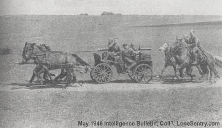 [A Tchanka machine gun cart for Maxim M1910 7.62-mm machine gun rolls across the steppes of Russia.]